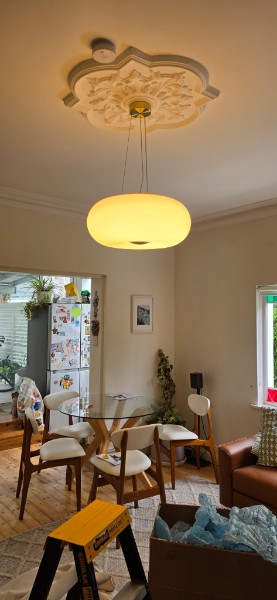 Pendant lighting over dining table